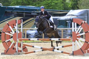 Amelia Ward riding Midnight Enigma